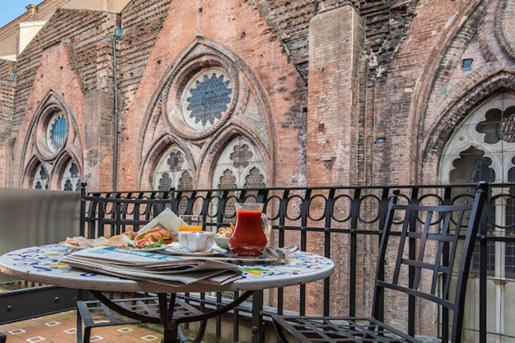 View on the side of the Basilica di San Petronio from deluxe room at Art Hotel Commercianti.