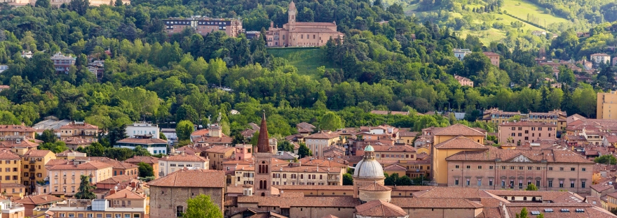 View of Bologna's hills and red roofs from city center