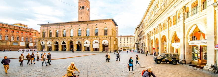 Piazza Maggiore in Bologna with people cycling